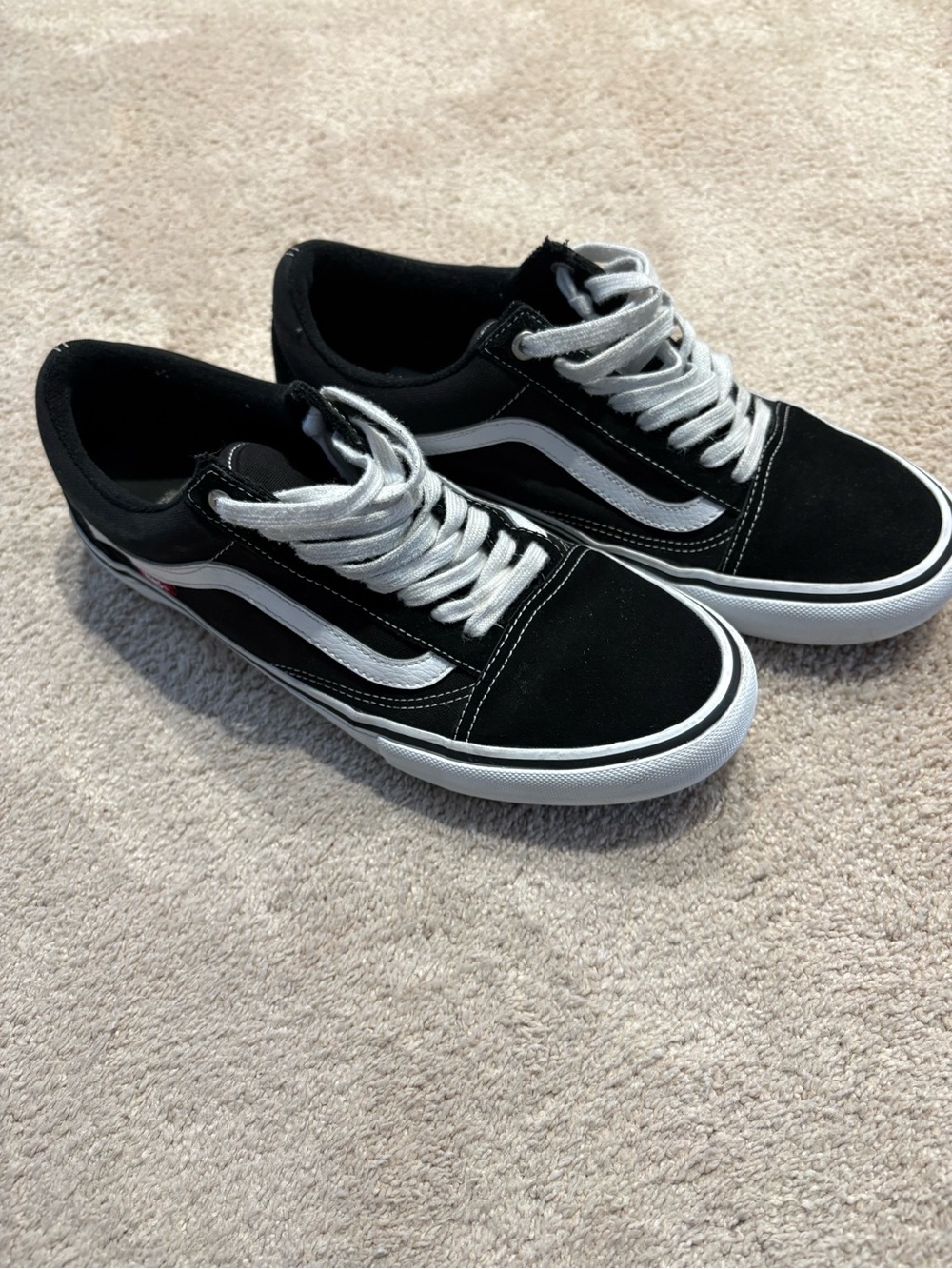 Vans Black and White Old Skool Low Top Sneakers